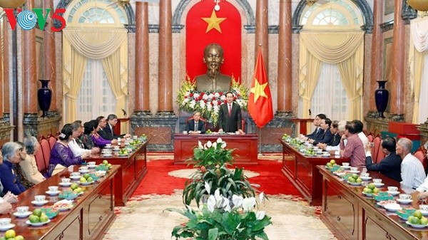 President Tran Dai Quang receives former Sai Gon-Gia Dinh security agents - ảnh 1